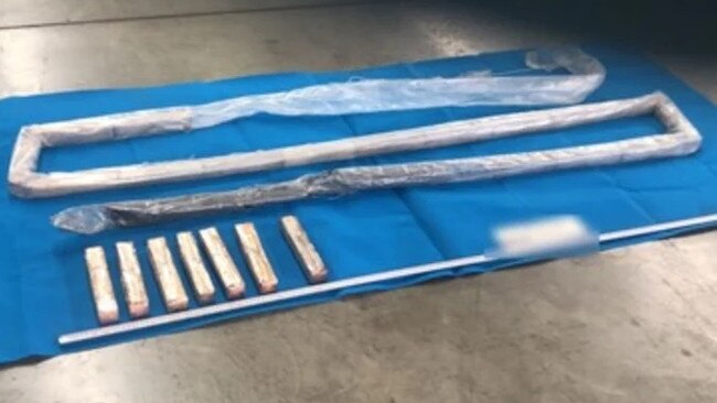 99 thin cocaine bricks were hidden in an "upper structural rail" in a shipping container. PHOTO: Supplied