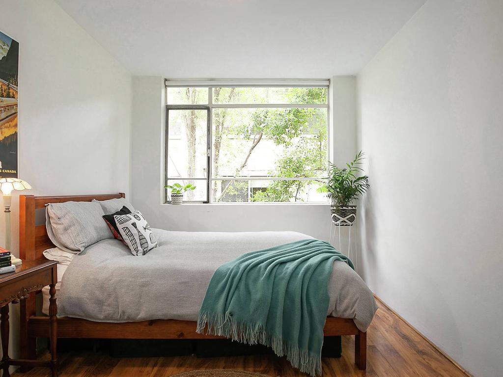 The bedroom at 18/30 Ewart St, Marrickville, is bright and breezy.