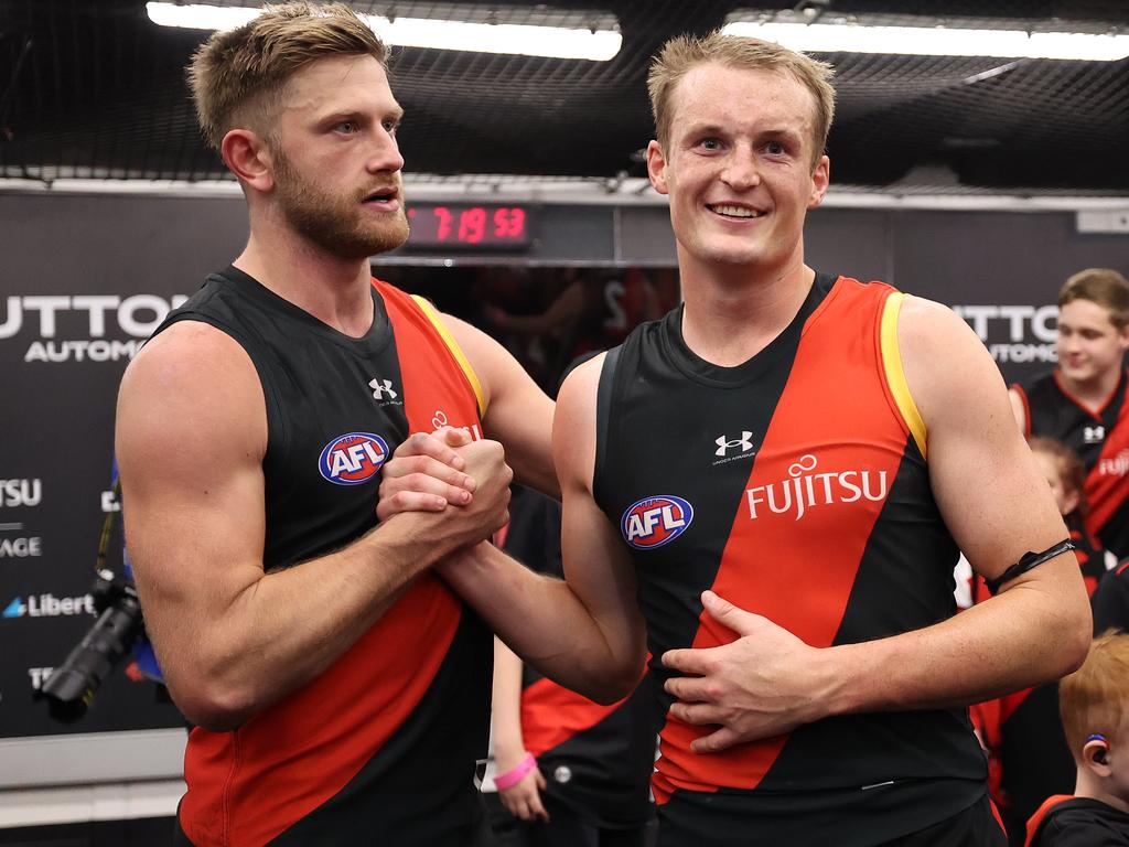 MELBOURNE, AUSTRALIA - MAY 11: Jayden Laverde and Mason Redman of the Bombers celebrate after the Bombers defeated the Giants during the round nine AFL match between Essendon Bombers and Greater Western Sydney Giants at Marvel Stadium, on May 11, 2024, in Melbourne, Australia. (Photo by Robert Cianflone/Getty Images)