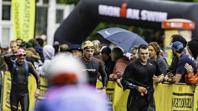 Athletes return from the swimming leg of the Ironman 70.3 Tasmania in Hobart on Sunday 4th February. Picture: Linda Higginson