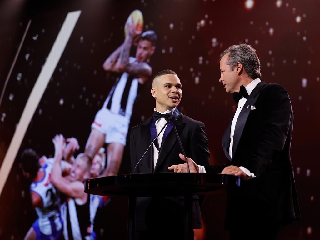 Bobby Hill with Hamish McLachlan after winning the Mark of the Year. Picture: Dylan Burns/AFL Photos via Getty Images.