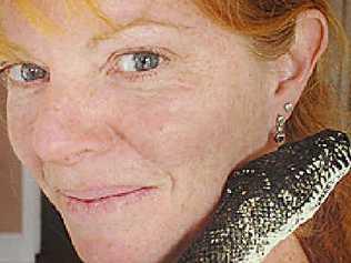 Wildlife carer Julie Curtis pictured with Sampson the carpet python. Jacklyn Wagner