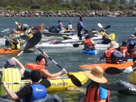 Scenes from the floating protest at Newcastle Harbour. Picture: Facebook