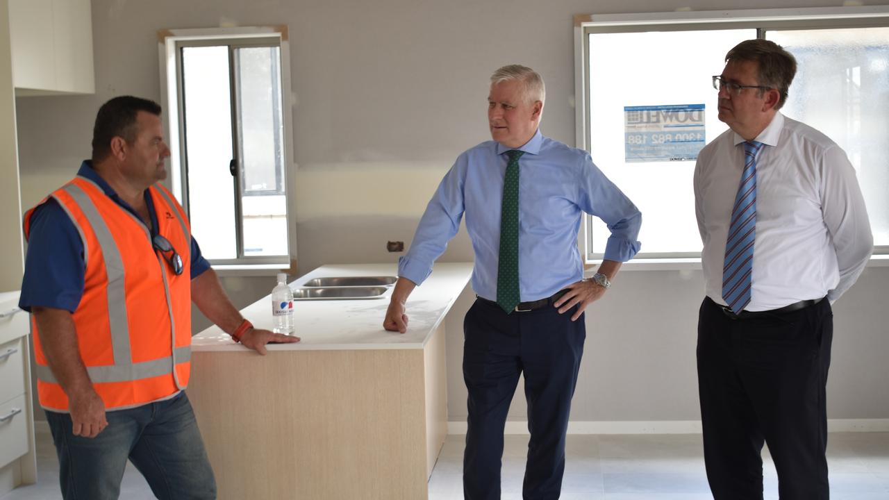 Deputy Prime Minister Michael McCormack and Senator Paul Scarr inspect a housing development at Ripley.