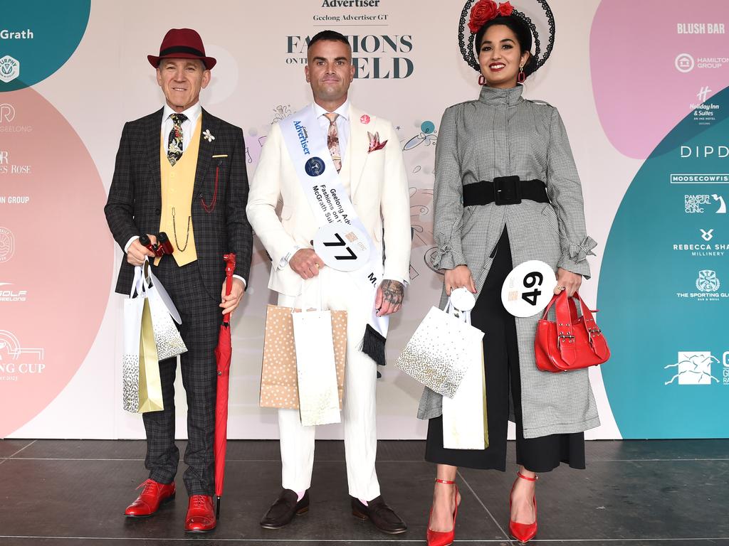 Michael Alpine, best suit winner Eric Grinham, and Ritu Kukreja. at Fashions on the field at Geelong Cup. Picture: David Smith