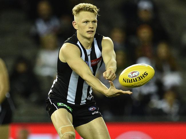 Adam Treloar was excellent in his 100th game. (AAP Image/Julian Smith)