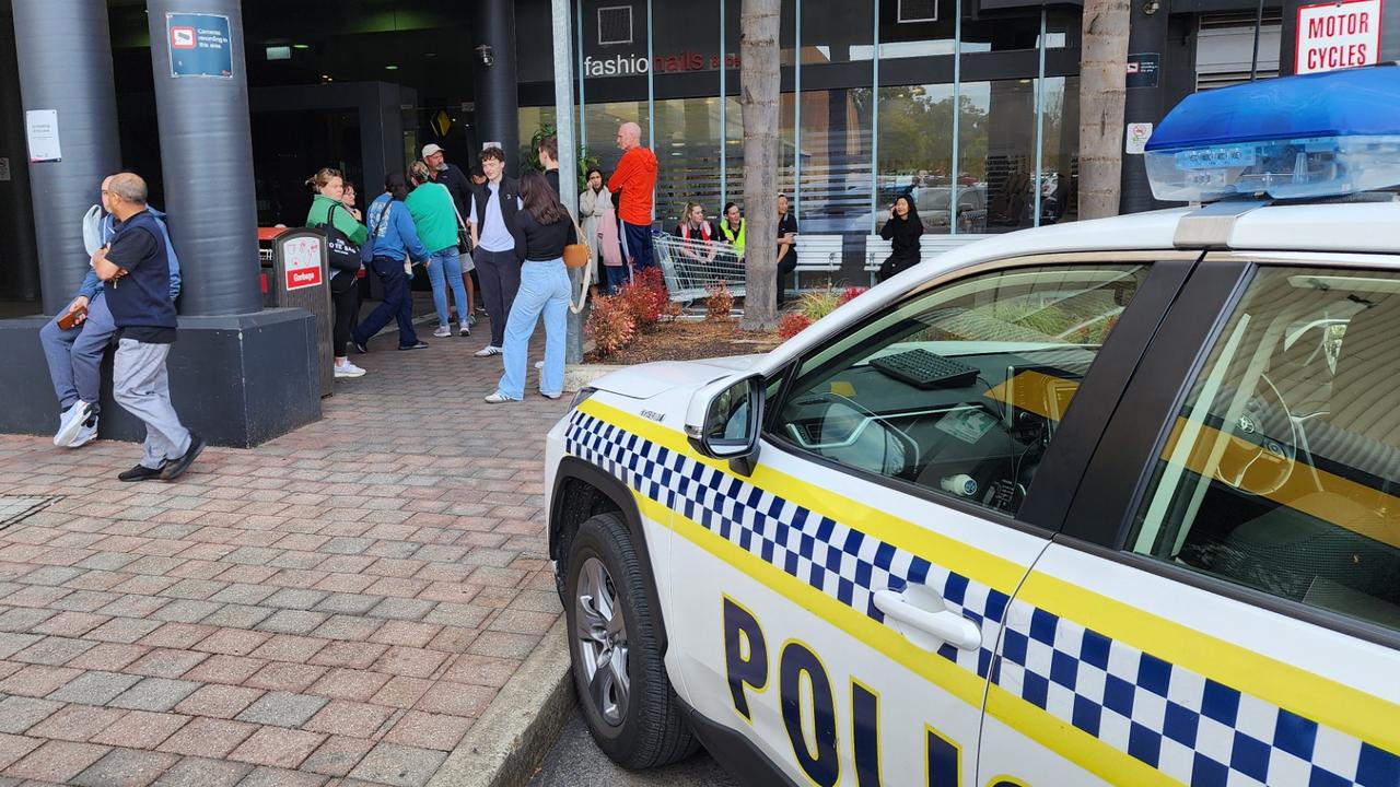 Shoppers fled outside the Westfield centre. Picture: NewsWire / Brenton Edwards