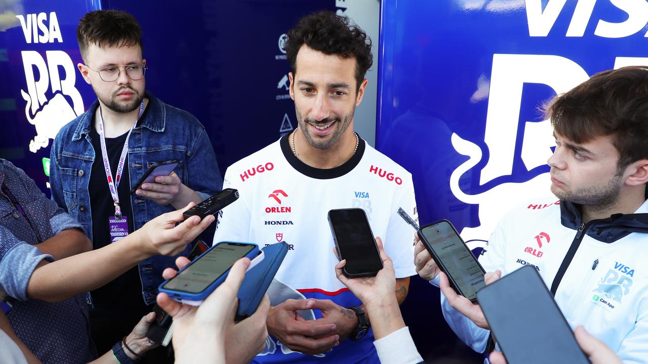 Daniel Ricciardo talks to the media in the paddock ahead of the F1 Grand Prix of China. (Photo by Peter Fox/Getty Images)