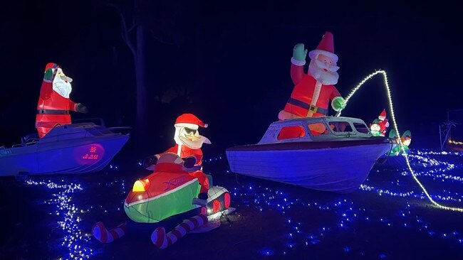 Beck and Rory Brown have over four actual boats incorporated into their Logan Village lights display. Picture: Supplied.