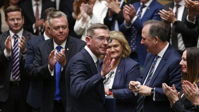 Perrottet is congratulated by colleagues in NSW Parliament after giving his valedictory speech last week. Picture: John Appleyard