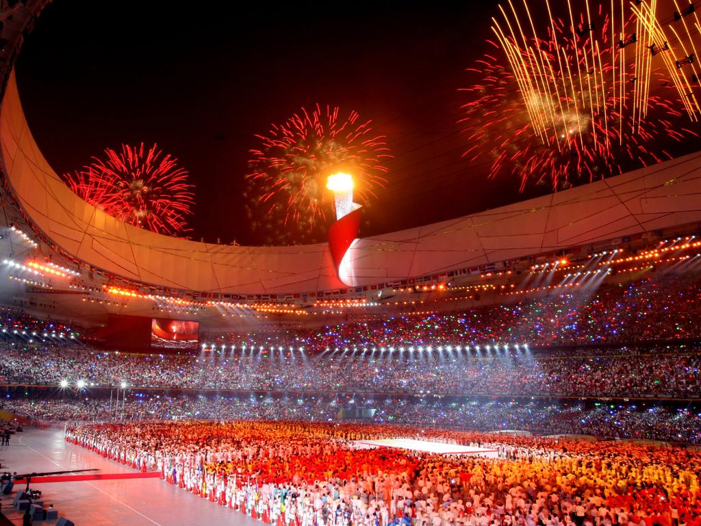 Beijing Olympics 2008. Opening Ceremony at the National Stadium. Gymnast Li Ning lights the Olympic Flame.