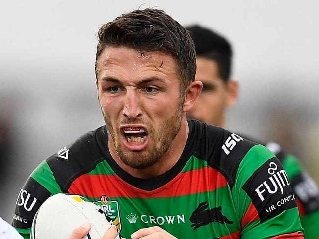 CAIRNS, AUSTRALIA - JULY 01:  Sam Burgess of the Rabbitohs looks to get past Enari Tuala of the Cowboys during the round 16 NRL match between the South Sydney Rabbitohs and the North Queensland Cowboys at Barlow Park on July 1, 2018 in Cairns, Australia.  (Photo by Ian Hitchcock/Getty Images)