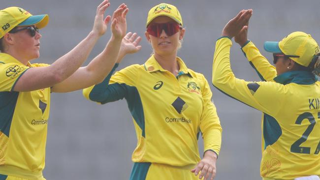 DHAKA, BANGLADESH - MARCH 27: Australia players celebrate the wicket of Sumaiya Akter of Bangladesh during game three of the Women's One Day International series between Bangladesh and Australia at Sher-e-Bangla National Cricket Stadium on March 27, 2024 in Dhaka, Bangladesh. (Photo by Abhishek Chinnappa/Getty Images)