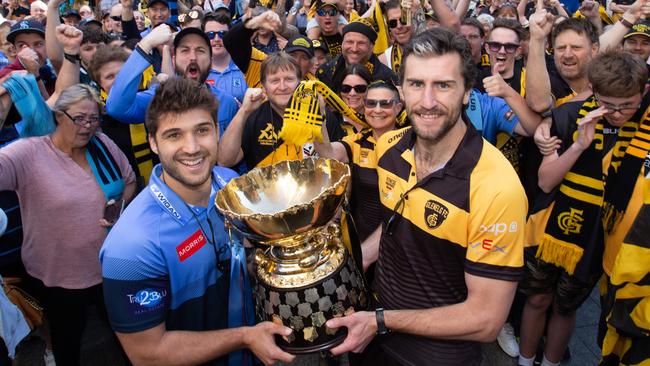 SANFL Captains James Battersby (Sturt) and Max Proud (Glenelg) with the SANFL Premiership Cup and fans in Rundle Mall. Picture: Brett Hartwig