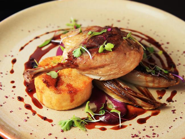 The Confit Duck with porcini infused polenta and caramelised witlof red cabbage puree / Picture: Toby Zerna