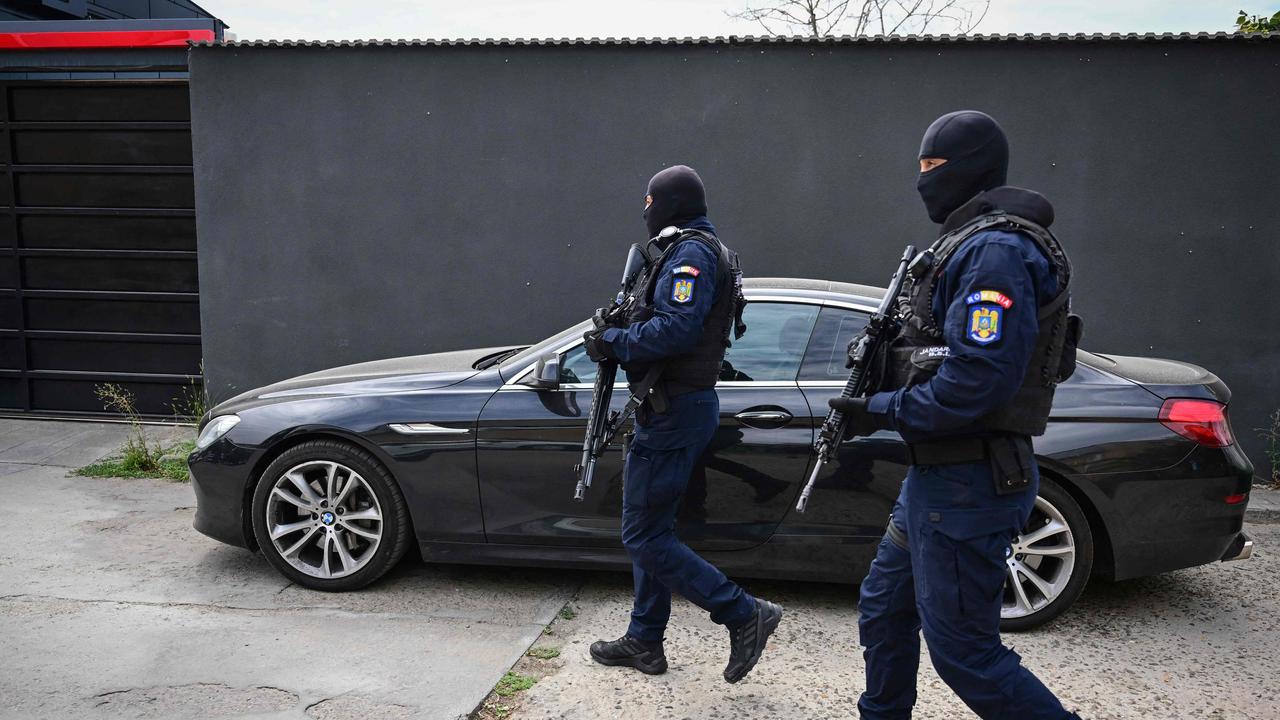 Their home raided as part of a search into a new investigation. Picture: Daniel Mihailescu/AFP