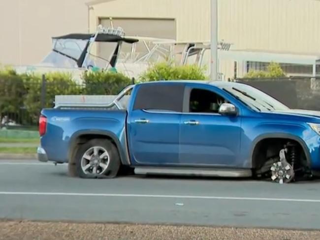 A man has been arrested following an hours-long standoff in Brisbane that led to an exclusion zone being set up., Queensland Police started chasing the ﻿blue Volkswagen Amarok Polar in the early hours of this morning., The chase continued before tyre spikes were deployed on Old Cleveland Road, finally dragging the car to slow a halt. Picture: 9News