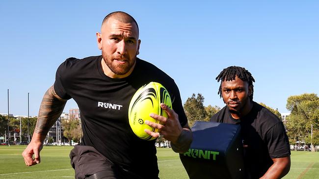 Nelson Asofa-Solomona and Blessing Sehweah promoting the RunIt competition. Picture: Ian Currie