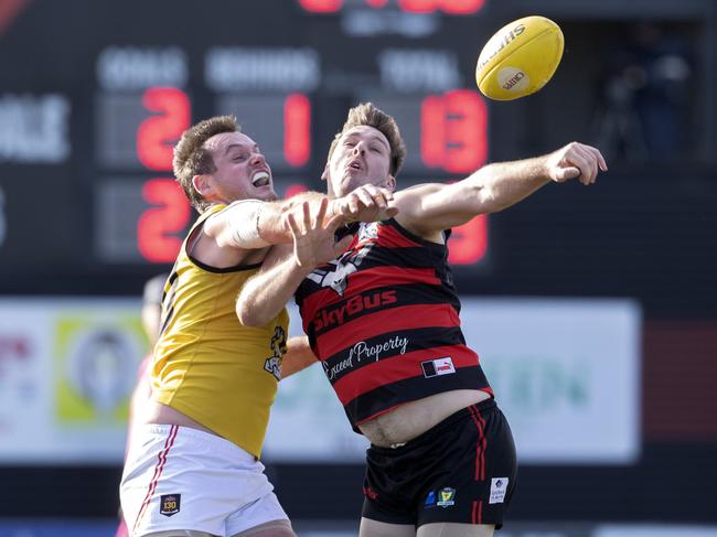 North Launceston’s Alex Lee (left) battles with Lauderdale’s Haydn Smith earlier this season. Picture: Chris Kidd