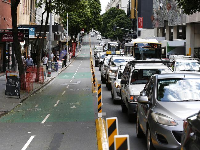 City traffic pictured on Edwards Street next to the new bike ways, Brisbane 26th of March 2021.  (Image/Josh Woning)