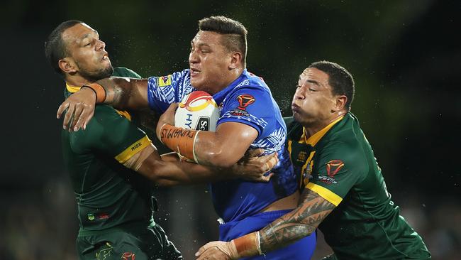 DARWIN, AUSTRALIA - NOVEMBER 17: Josh Papali of Samoa is tackled during the 2017 Rugby League World Cup Quarter Final match between Australia and Samoa at Darwin Stadium on November 17, 2017 in Darwin, Australia. (Photo by Mark Metcalfe/Getty Images)