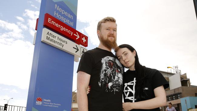 Josh McGee with girlfriend Jill Helm outside Nepean Hospital where she claims she was attacked. Picture: David Swift