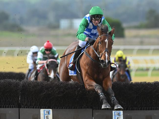 PAKENHAM, AUSTRALIA - JULY 21: Steven Pateman riding Stern Idol jumps the last before winning Race 6, the Ecycle Mosstrooper Steeplechase - Betting Odds, during Mosstrooper Jumps Day at Pakenham Racing Club on July 21, 2024 in Pakenham, Australia. (Photo by Vince Caligiuri/Getty Images)