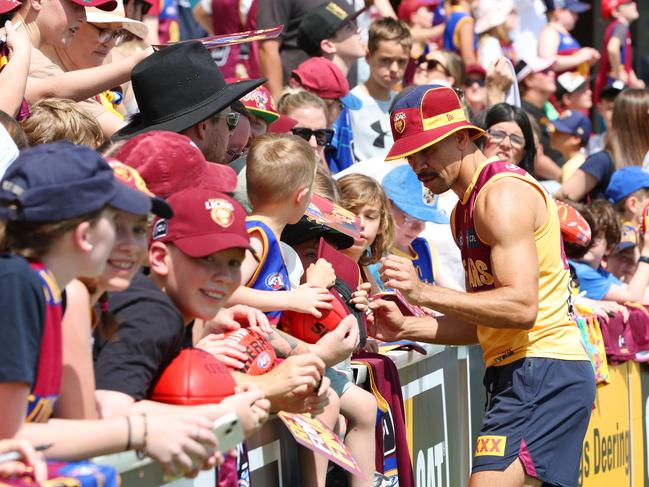 Charlie Cameron signs autographs with fans ahead of the AFL grand final. Picture: Lachie Millard