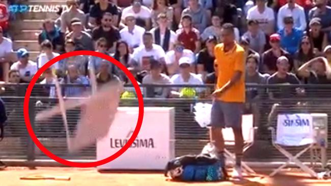 Nick Kyrgios throws a chair (circled) onto the court during his Italian Open meltdown.