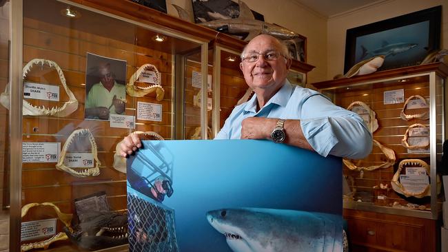 Rodney Fox at home with his shark artifact collection. Picture: Naomi Jellicoe