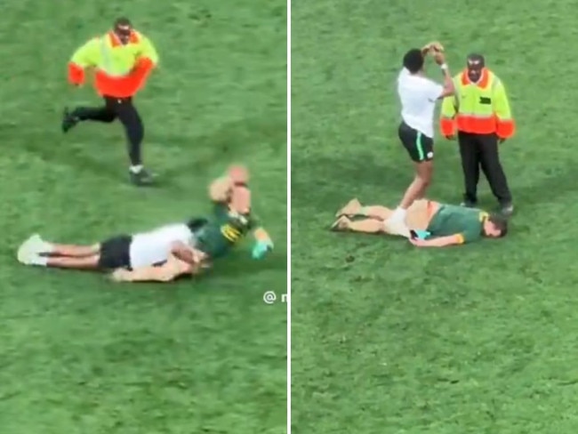 Pitch invader knocked out cold