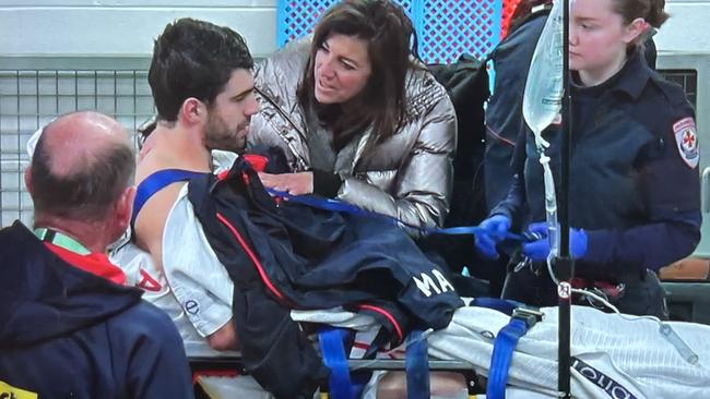 Christian Petracca on his way to hospital after an accidental knee in the ribs