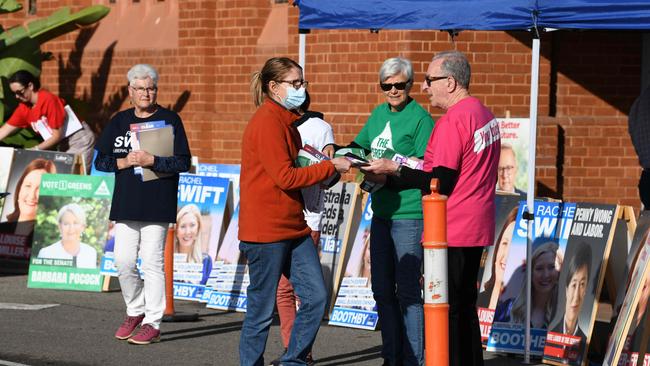 ADELAIDE, AUSTRALIA - NewsWire Photos MAY 16, 2022:  Voters and volunteers at an early polling booth in Daw Park in the electorate of Boothby. Picture: NCA NewsWire / Naomi Jellicoe