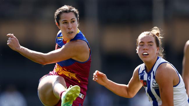 Ally Anderson (left) gets a kick away during Brisbane’s AFLW grand final win over North Melbourne. Picture: Michael Willson/AFL Photos via Getty Images