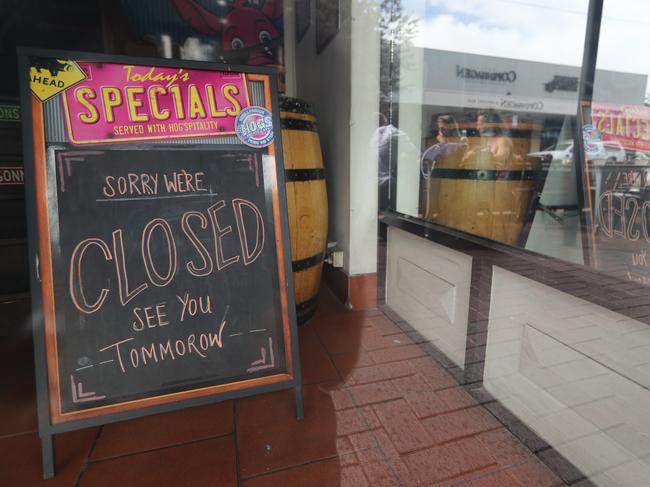 Signage at the Hog's Breath Cafe, Glenelg. Photo: Tait Schmaal