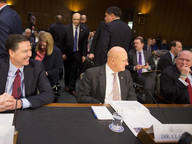 (Left to right) James Comey Director of FBI, James Clapper Director of the NSA, and John Brennan Director of the CIA. Picture: AFP