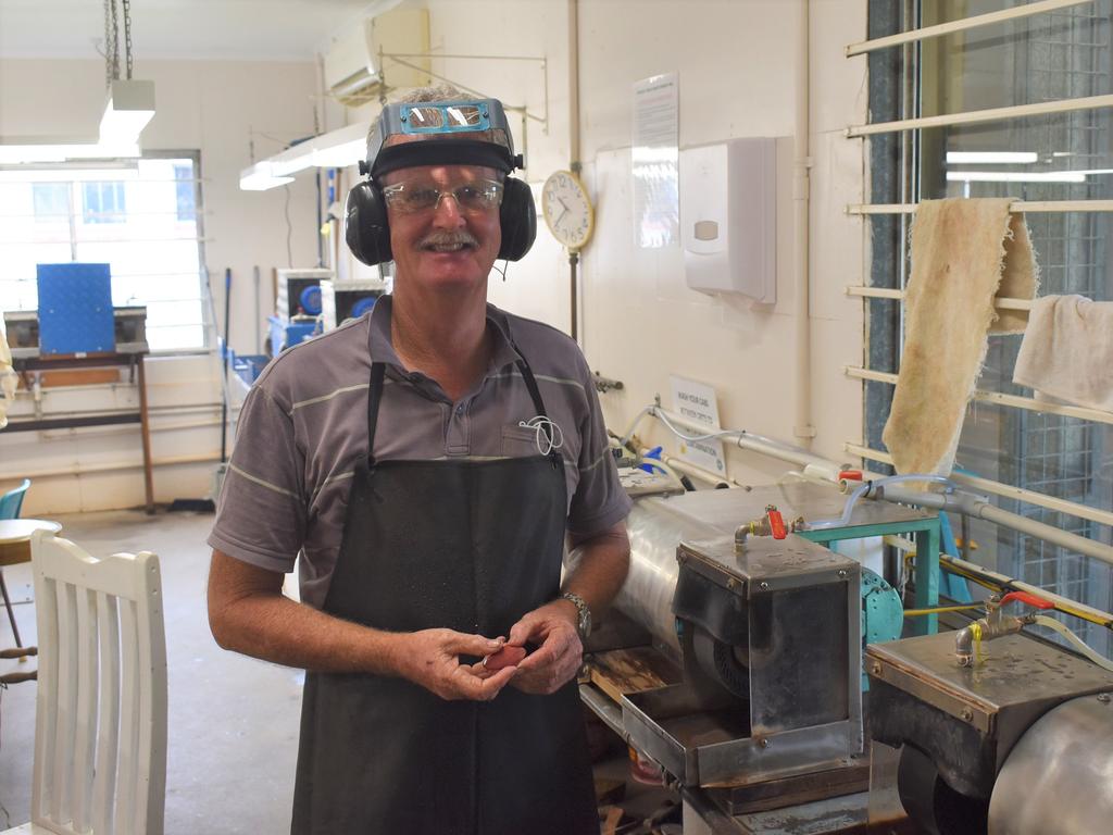 Mackay Gem and Crafts Society member Don Foster grinding a rock. Picture: Matthew Forrest