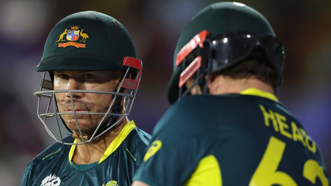 GROS ISLET, SAINT LUCIA - JUNE 15: David Warner of Australia looks on before walking onto the field for the second innings during the ICC Men's T20 Cricket World Cup West Indies & USA 2024 match between Australia and Scotland at Daren Sammy National Cricket Stadium on June 15, 2024 in Gros Islet, Saint Lucia. (Photo by Robert Cianflone/Getty Images)