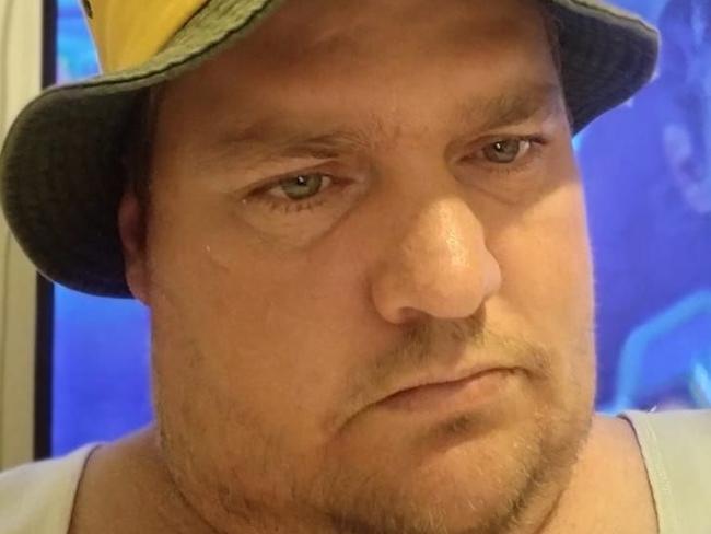 James Neale is in a coma after being shot by a police officer at a Kilkivan home where he allegedly stabbed his uncle to death.
