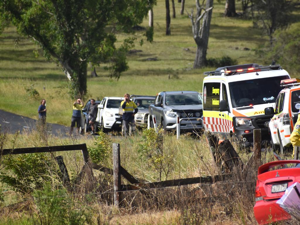 Traffic was blocked in both directions after a red sedan Mitsubishi Lancer sedan crashed into a power pole on Rogans Bridge Rd north of Waterview Heights on Thursday, 18th February, 2021. Photo Bill North / The Daily Examiner