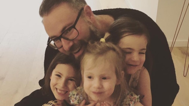 Darren Levin with his three daughters. Picture: Supplied