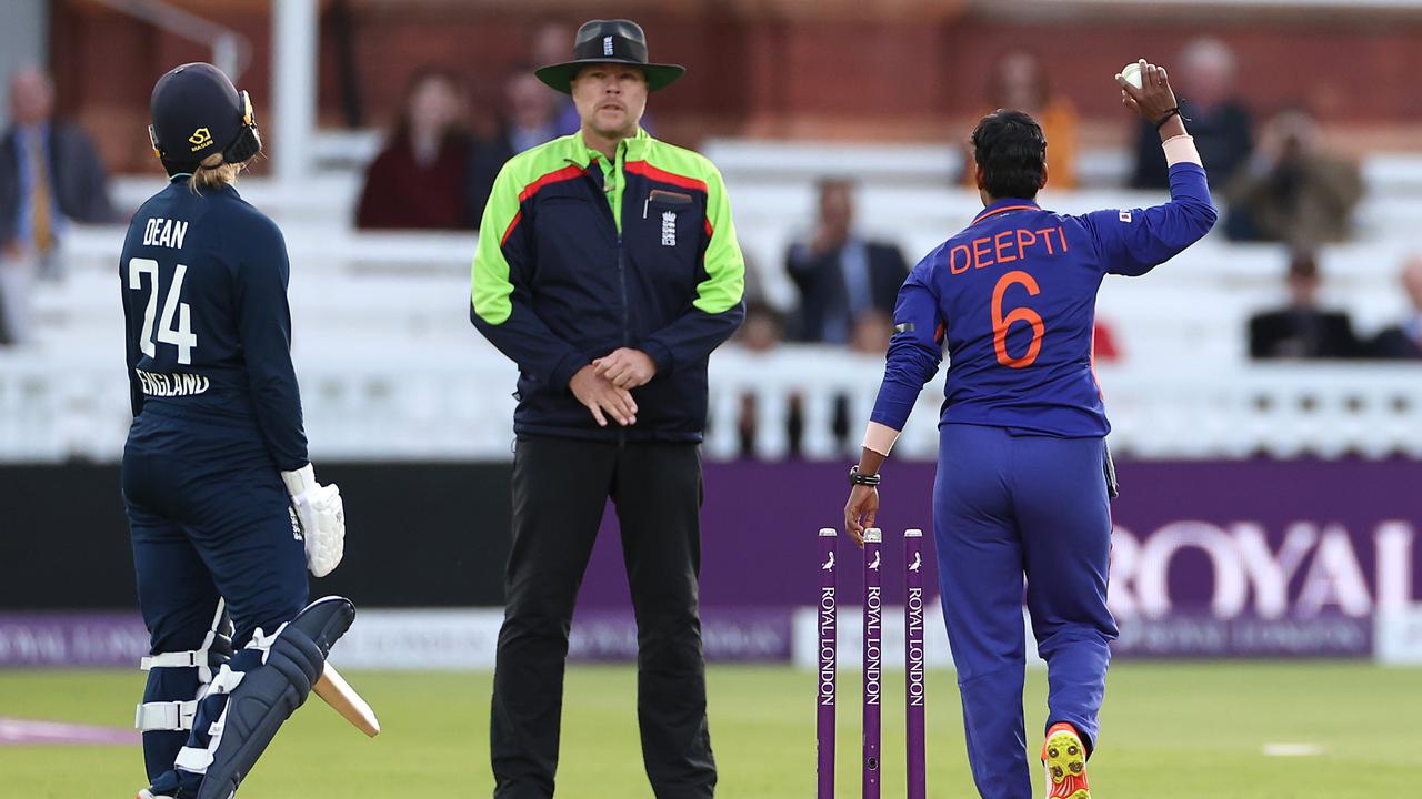 Charlie Dean of England reacts after being run out by Deepti Sharma of India. Photo by Ryan Pierse/Getty Images