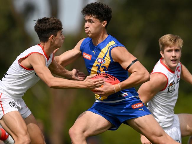 MELBOURNE, AUSTRALIA - MARCH 25: Keighton Matofai-Forbes of the Jets takes possession of the ball during the round one Coates Talent League match between Western Jets and Sydney Swans Academy at Highgate Reserve on March 25, 2023 in Melbourne, Australia. (Photo by Morgan Hancock/AFL Photos/via Getty Images)