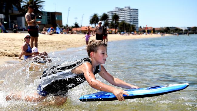 Max, 7, beats the heat at St Kilda beach. Picture: Nicole Garmston