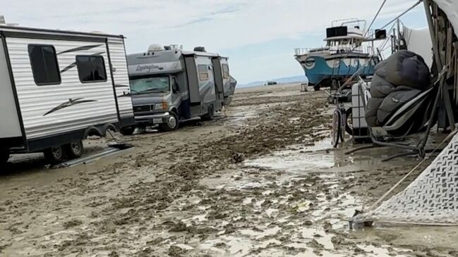 Burning Man Attendees Stranded in Mud as Rain Washes Out Festival