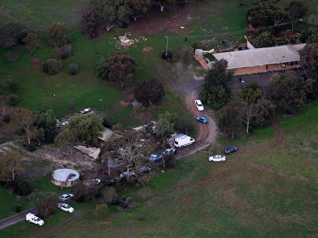 Police at the house in Hillier, in Adelaide’s north, on the day the three bodies were found. Picture: Sam Wundke/Nine News helicopter