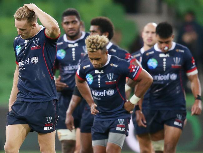 Dejected Rebels after their surprise defeat at AAMI Park. Picture: Getty Images