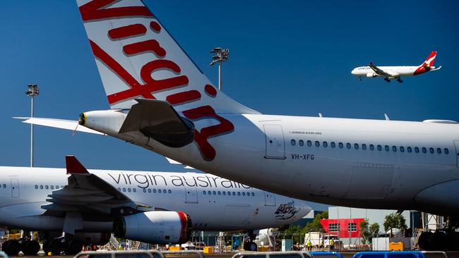 Virgin Australia’s sale to Bain Capital is all but complete after the Federal Court ordered all shares in the airline be transferred to the US private equity firm. Picture: Patrick Hamilton/AFP