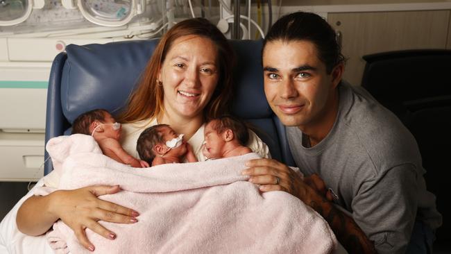 Keely Walsh and Mathew Alves with identical triplet daughters Niara, Aurora, and Moana born on January 2nd at 32 weeks. Picture: Nikki Davis-Jones