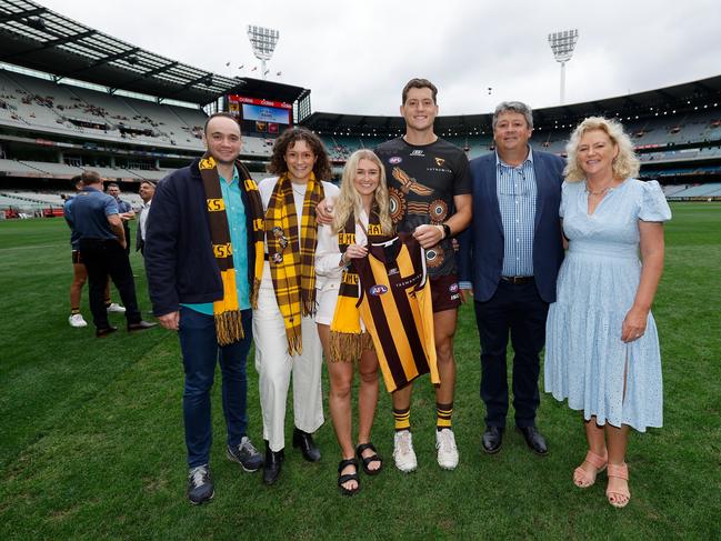 Lloyd Meek with his family before making his Hawthorn debut against Essendon in round one. (Photo by Dylan Burns/AFL Photos via Getty Images)